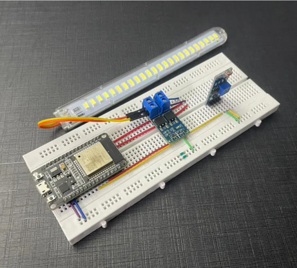 Automatic Night Lamp Using ESP32 and LDR project setup on breadboard for Grade 8 STEM Activities